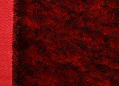 Mohair (Steiff-Schulte) rot mit schwarzen Spitzen gelockt, ca. 23 mm